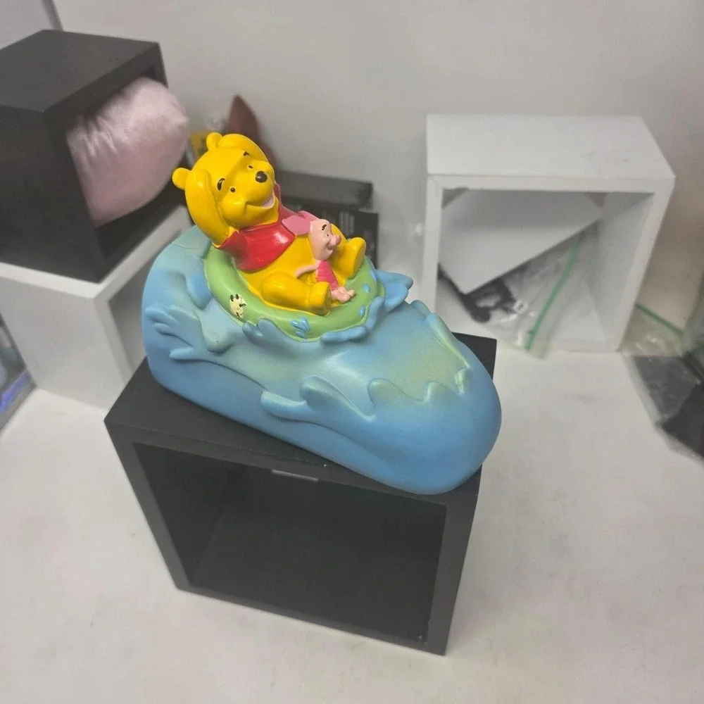 winnie the pooh vintage bathtub handle cover?